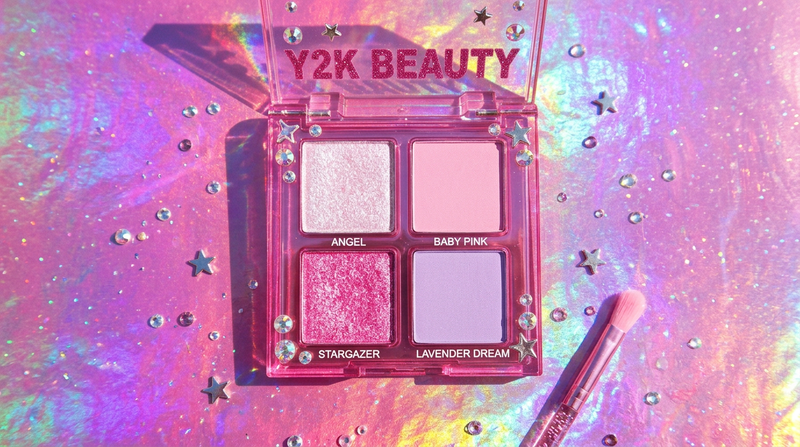 Mini Shadow Quad 4-pan eyeshadow palette flat lay on holographic pink background Y2K beauty styling