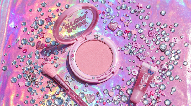 Satin Blush Powder compact flat lay on bubblegum pink holographic background with rhinestone crystals and star charms, Y2K maximalist beauty photography